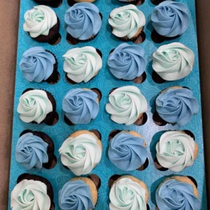 Overhead image of a variety of Mini Cupcakes in blue tones, ideal for your event.